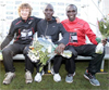 Jonny Hay with  Eliud Kipchoge and  Kenenisa Bekele 